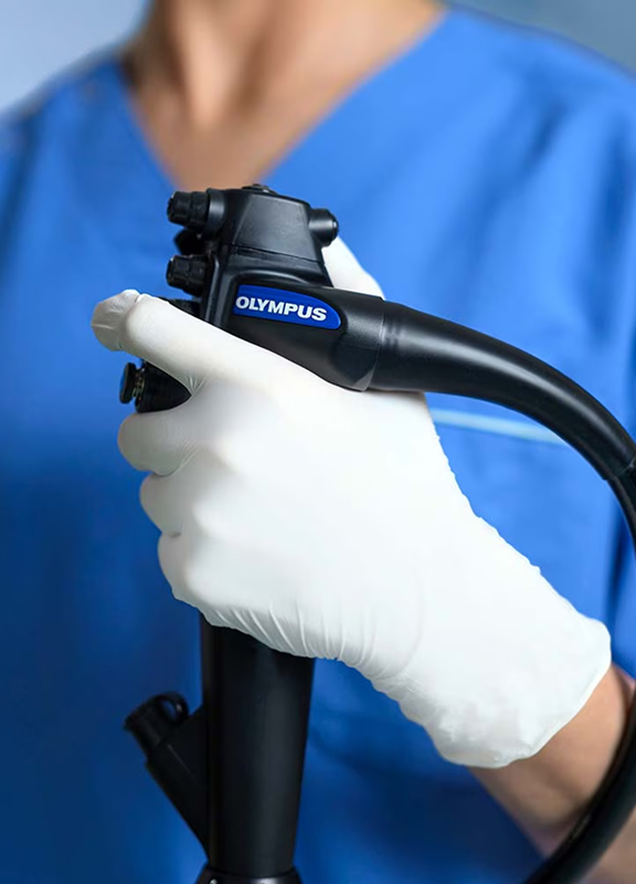 Healthcare worker using an endoscope